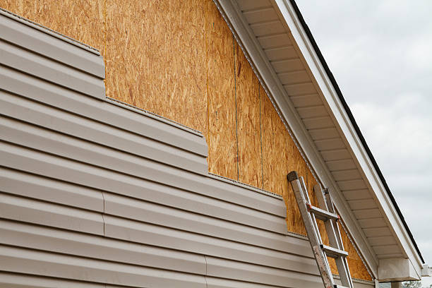 Professional Siding Replacement technician working in Oaks, PA